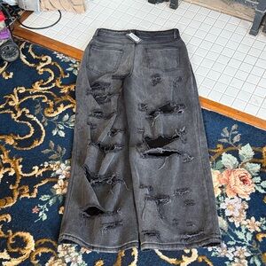 PrettyLittleThing extreme high waisted cut out detail jeans in black. NWT.